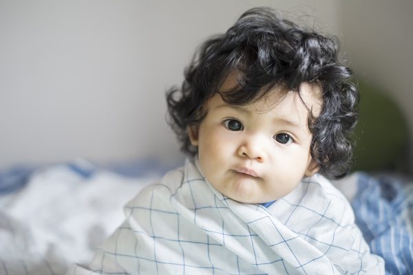 Deze baby met giga haardos wordt het nieuwe gezicht van een shampoomerk