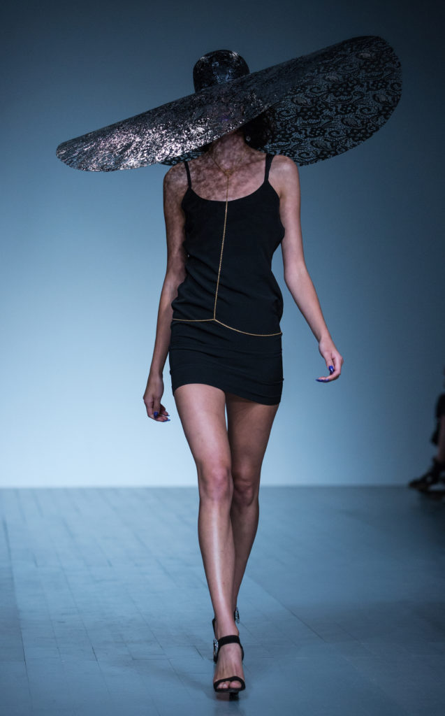 A model walks the runway at the Marta Jakubowskis show