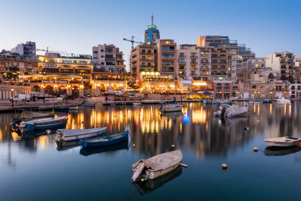 Spinola Bay at dusk, St Julian's, Malta, Europe