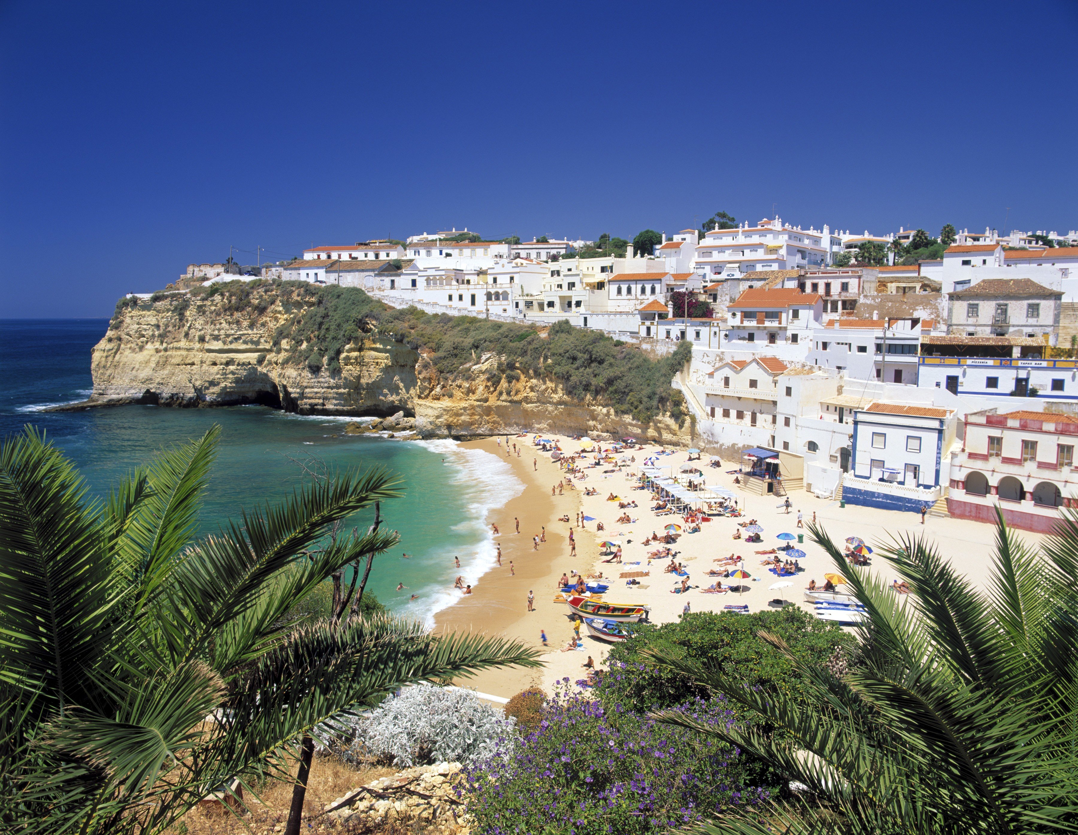 Mandatory Credit: The Travel Library / Rex Features Ltd. VIEW OF BEACH & TOWN, CARVOEIRO, ALGARVE, PORTUGAL VARIOUS