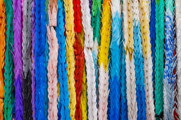 Full frame of traditional Japanese origami paper cranes