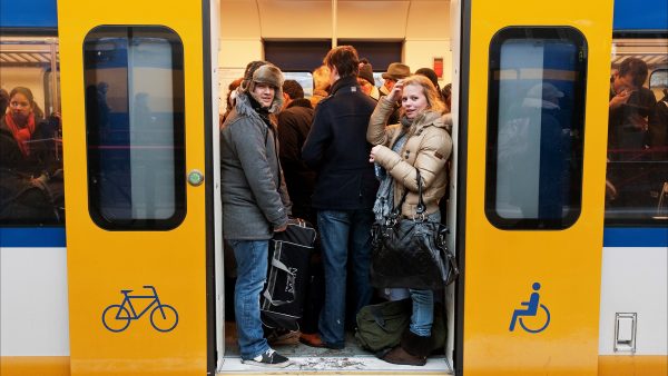 Nederlanders reizen verder naar werk