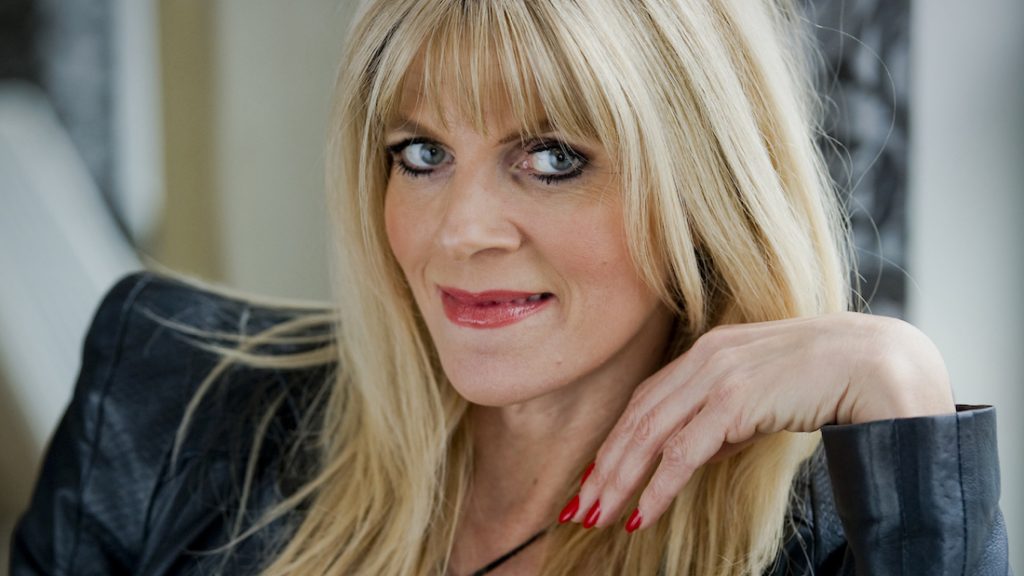 Kim Holland geeft les aan jongeren over sex en porno ANP