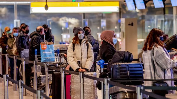 Schiphol druk corona ANP