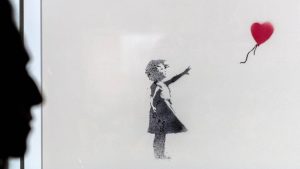 Thumbnail voor 'Girl with Balloon' van Banksy voor 3,1 miljoen pond geveild