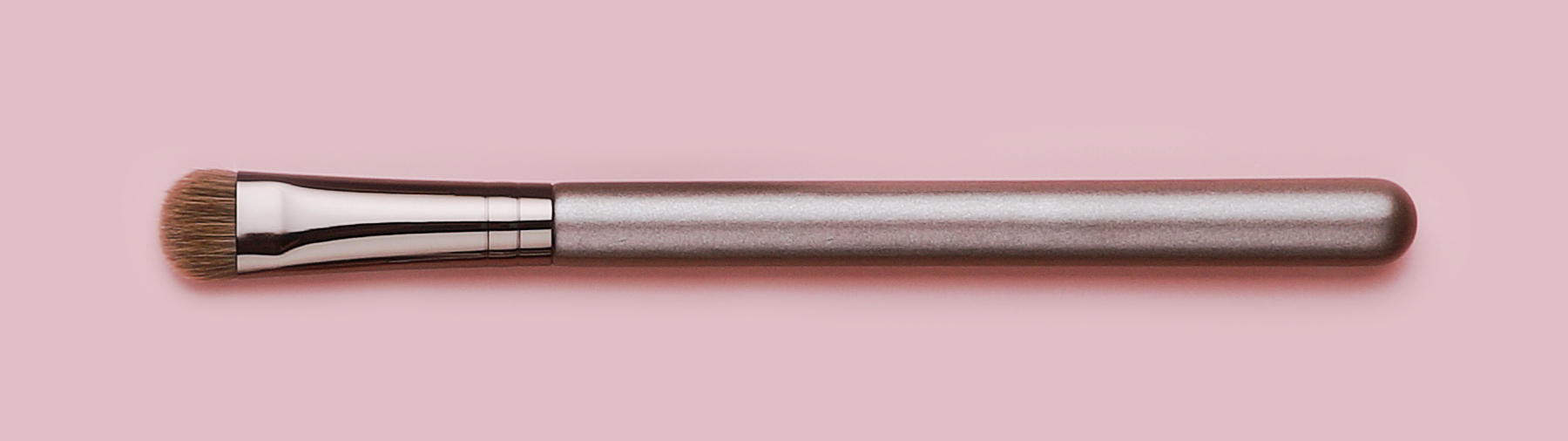 Een flat shader brush voor een roze achtergrond