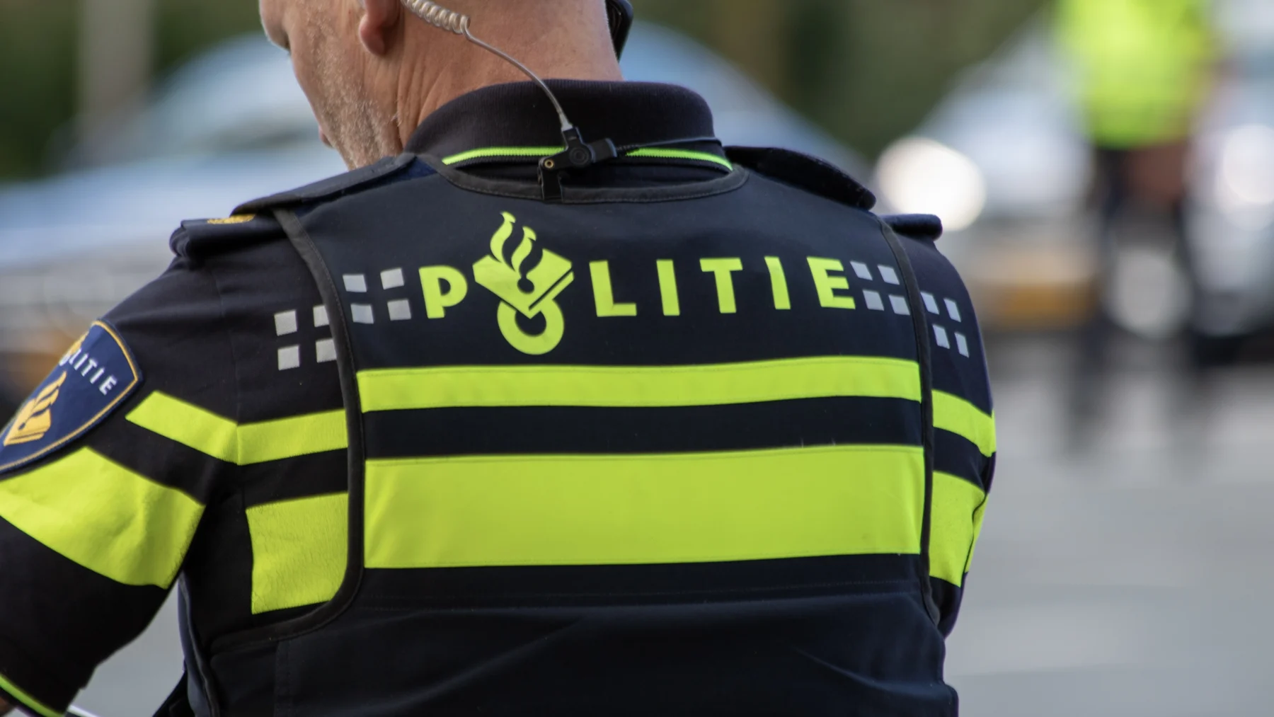 Afbeelding van man met politie-uniform