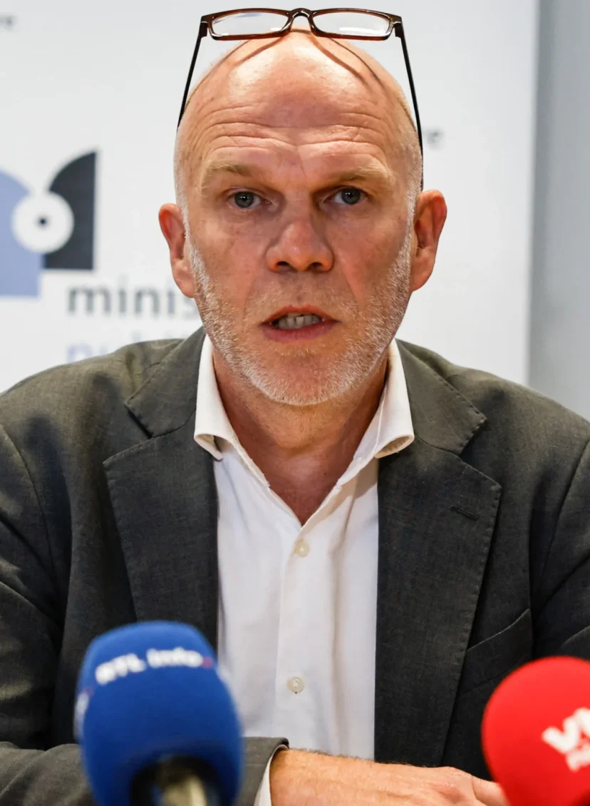 Aanklager Vincent Macq tijdens een persconferentie