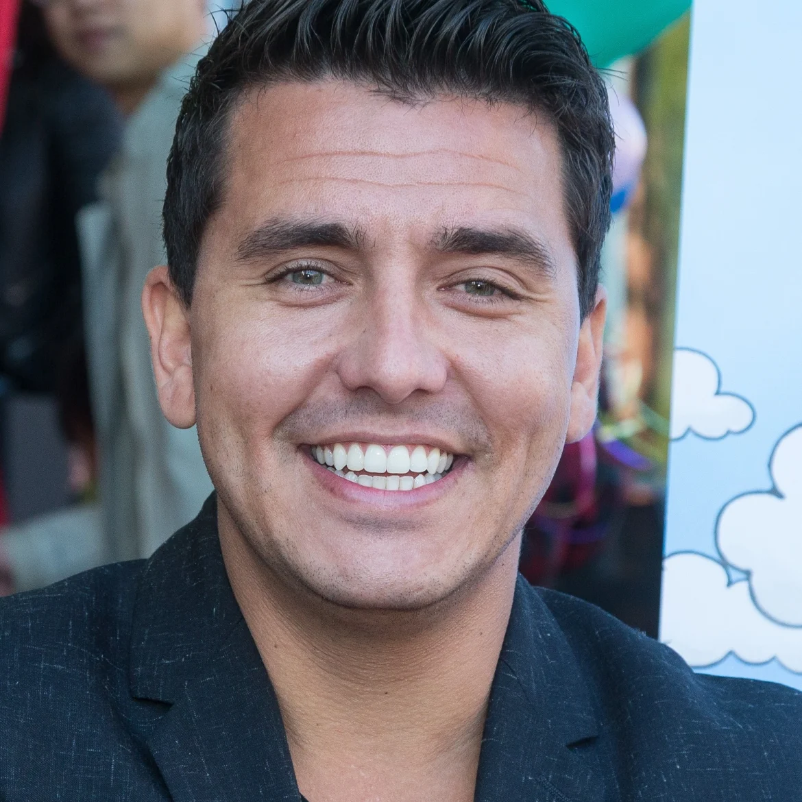 Jan Smit spot zijn eigen handdoek op het strand