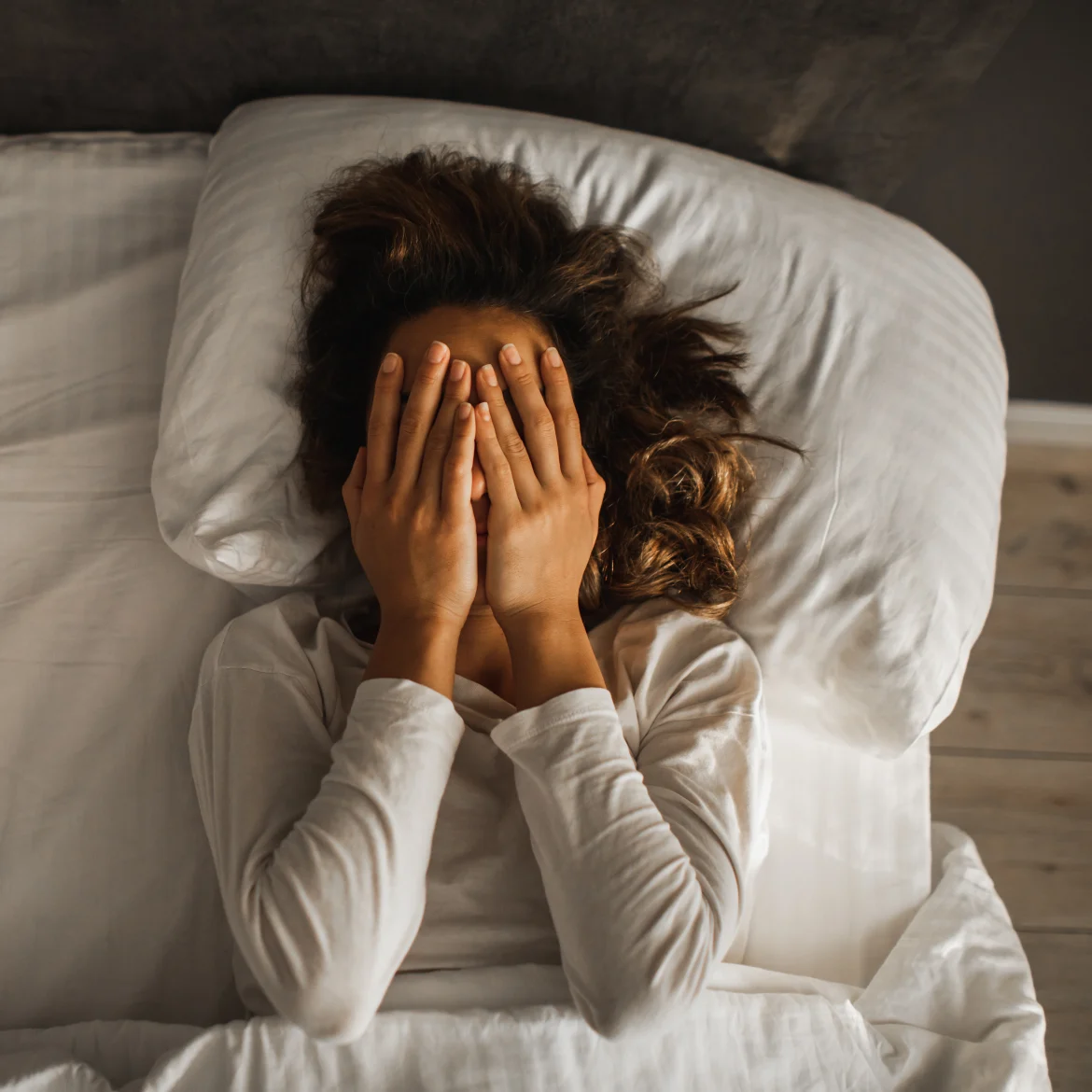 Vrouw in bed met gordelroos