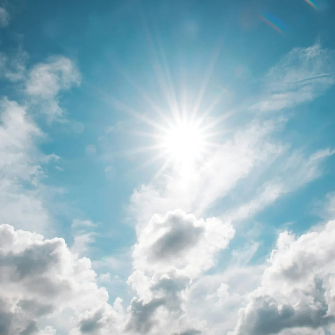 Zon met bewolking