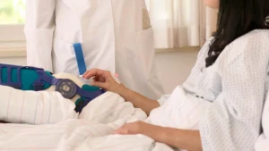 Vrouw in ziekenhuisbed | blaar