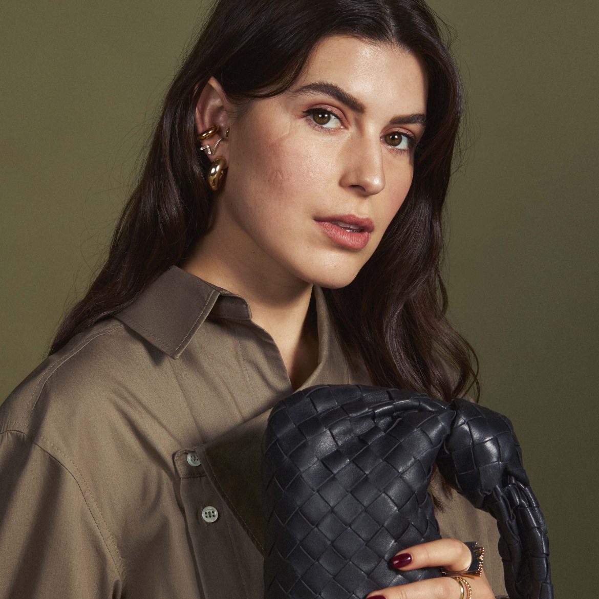 Op vakantie? Nee, Eva (28) koopt liever een designertas: 'Ik werk graag voor iets tastbaars'